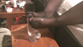 Oily footjob on dildo