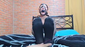 Mich's feet in Irish cuffs are spanked and tickled while she is gagged