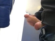 Gay boy is jerking off in public restroom and shoot his load in a urinoir