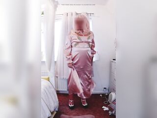 Sissy crossdresser in full length pink satin suit