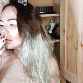 modest stepsister smokes a cigarette