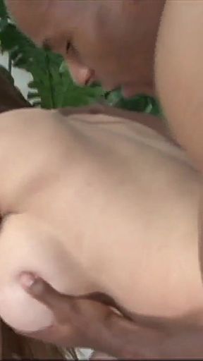 Interracial porn with June Summers a slutty MILF with two big boobs gets turned on with a cock in her pussy