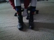 Becky putting on  socks and Harley boots