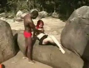 Redhead Tgirl fucked by black dude outdoors