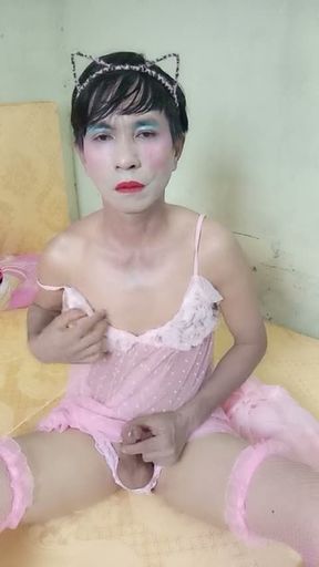 Oanh Le transgender wearing a sexy robe masturbating happily