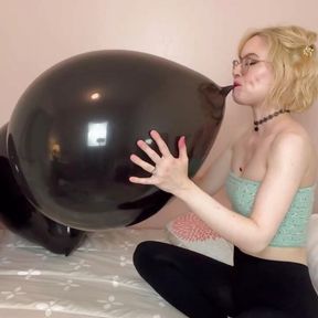 Blowing up Three 18 inch Black Balloons then Popping them!