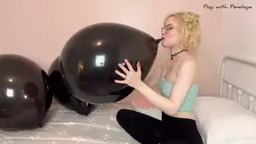 Blowing up Three 18 inch Black Balloons then Popping them!