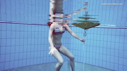 Big tits teenie Liza Bubarek swimming naked in the pool