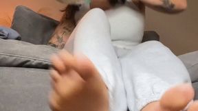 Giantess Sammie makes her tiny slave worship her feet during movie night