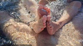 Hot unstaged sisters get footjobs in outdoor bathtub 3some