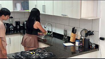 Latina roomie gives it to her in the kitchen