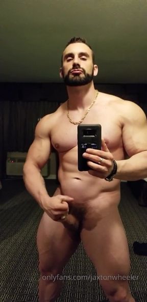 Gigantic muscled hairy man cums in front of mirror