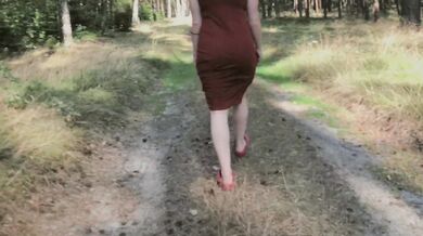 Playful Redhead Pissing in Forest and Showing her Big Boobs