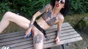 Lucy Raven smoking and diloing her pussy in a public park