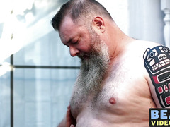 Nasty fat bear makes his cub go on knees to blow his rod