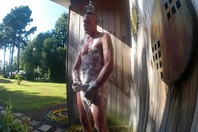 mature Step daddy jerks off in outdoor shower