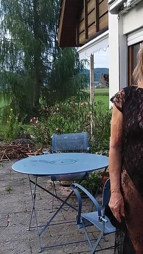A Mature Woman Shows off Her Figure Outside in a Lace Bodysuit!
