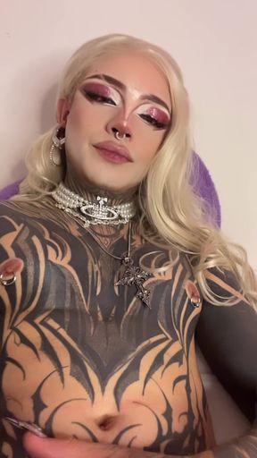 Tattooed performer in makeup