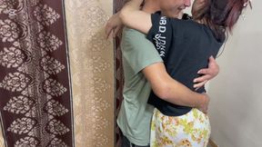 Two lovers have sex by the window