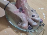 Amputee man fills his beautiful and skillful feet with cream, strawberry and blueberries for you