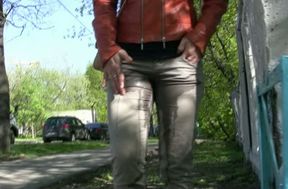Curvy blonde chick in tight pants peeing in public places