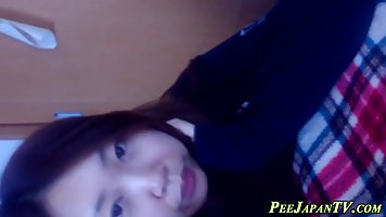 Japanese babe is often peeing in the bath tub and making a video of it