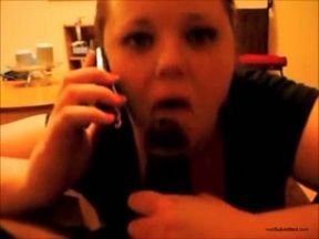 Chubby white lady eats big black dick and talks on the phone