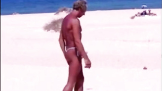 Tanned guy on beach in tiny string thong (temporarily!) 3