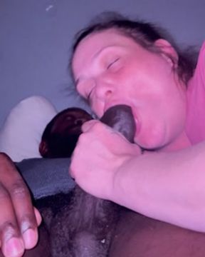 Big mouth takes a thick black cock down her throat