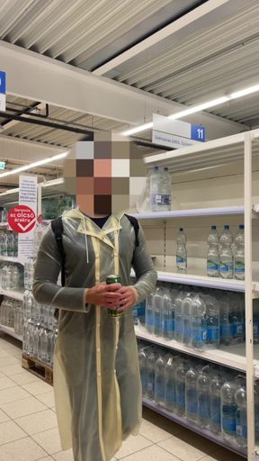 Wearing transparent latex raincoat in public