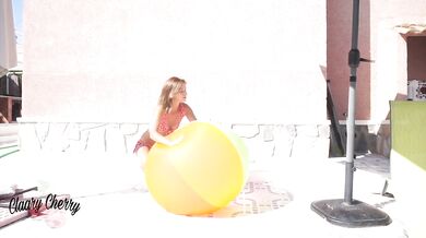 I inflate a giant beach ball and play with it - Claary Cherry