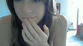 Beautiful naked babe shows off her titties on camera