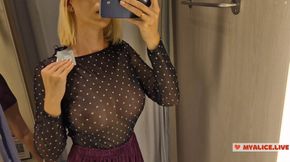 Trying on completely transparent clothes in the fitting room. Look at my boobs in a public place.