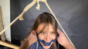 Marie bound, gagged and spanked in shiny nylon Shorts and a Windbreaker