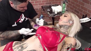 Amber Luke masturbates while getting inked