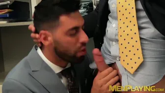 Two suited businessmen fuck hard in real office