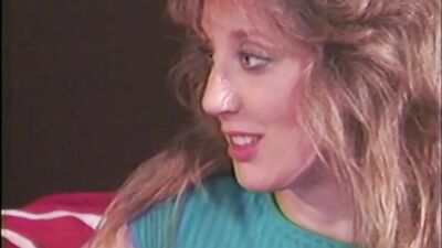 Classic porn video shows horny MILF riding a black pecker