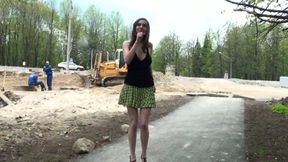 Mesmerizing redhead college girl flashes her boobies on the construction site