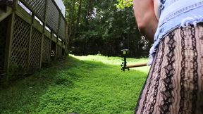 Big Fake Tits Crossdresser in Daisy Dukes Mowing Grass