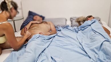 Horny girlfriend sneaks into her friend couple bedroom and tried secretly use man, but wife woked up