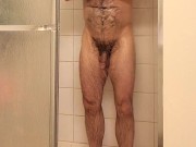 Hairy muscle bear showers and flexing