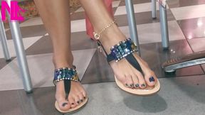 Dangling and Shoeplaying in a Bar with My Blue Estrada' Flip Flops