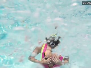Irina Poplavok blonde pornstar in the pool