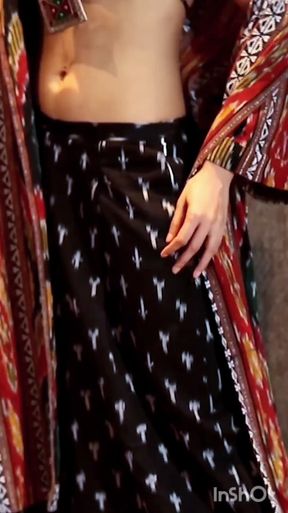 Indian babe seduces with her belly button piercing
