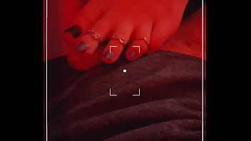 Footjob with beautiful toe rings!! under red lights