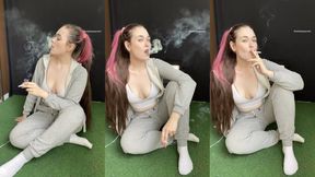 Smoking in a grey hoodie, sweatpants and a crop top with cleavage. My hair up in a ponytail - smokingrapunzel - smoking fetish