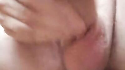 Close-up footage of stepdad playing with his hard willy