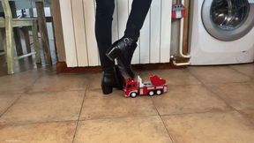 TOY TRUCK CRUSHED UNDER HER BOOTS - MOV HD