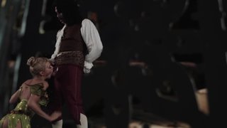 A hot blonde with large tits is having her cunt fucked by a horny dude