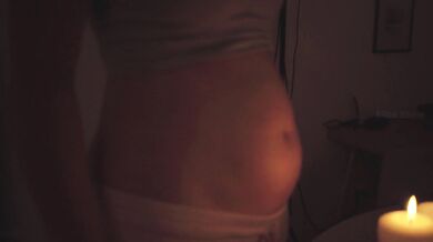 After dinner belly storms back while candlelit pajamas cling before overflow